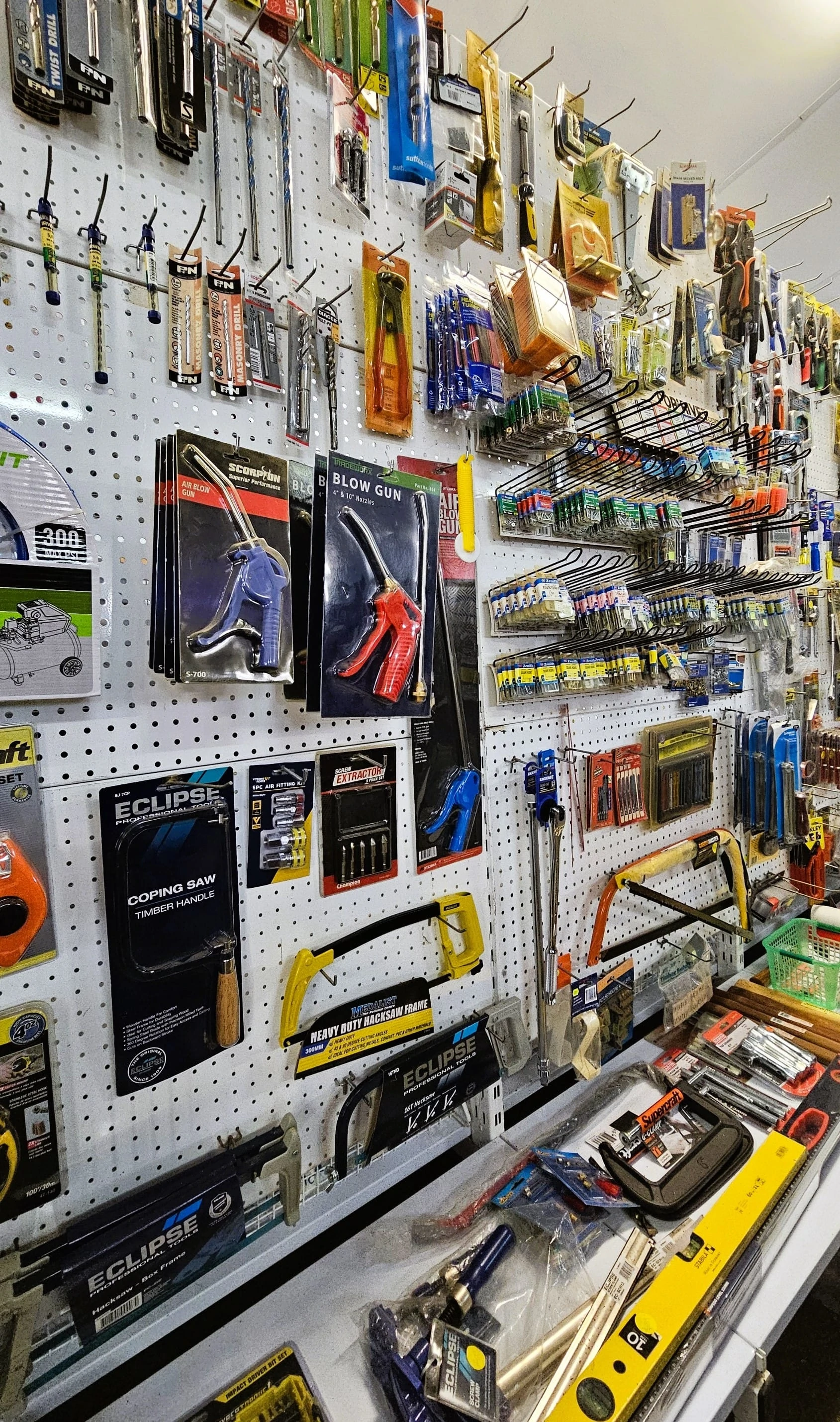 A store interior displaying various tools and items neatly arranged on the walls.